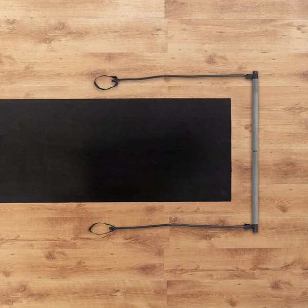 Pilatesstång med motståndsband