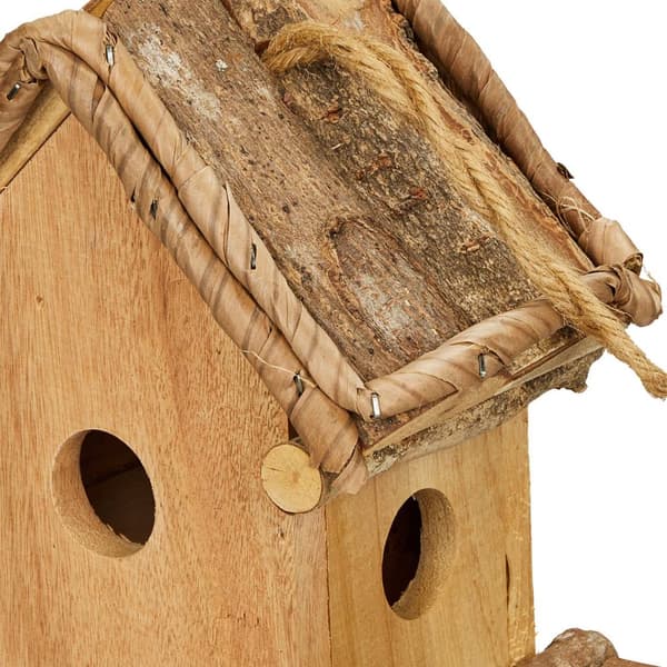 Dekorativt fuglehus med foderstation