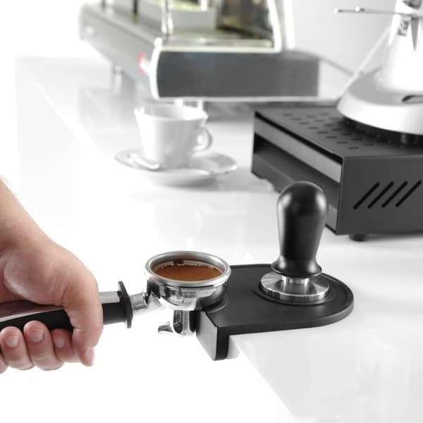 En matte for en benkeplate under en kaffetamper - singel