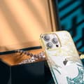 Miniatyrbillede 5 af 6: Luksuriøst iPhone 14 Plus cover med Phoenix Series krystaller, guld og blå