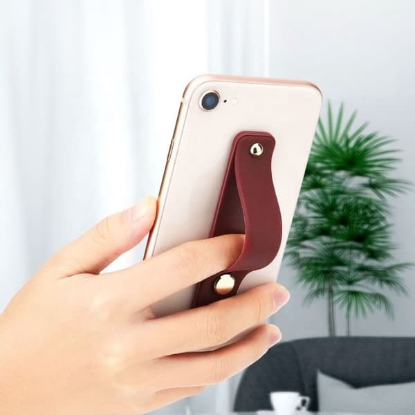 Selvklebende fingertelefonholder med grå skyveknapp