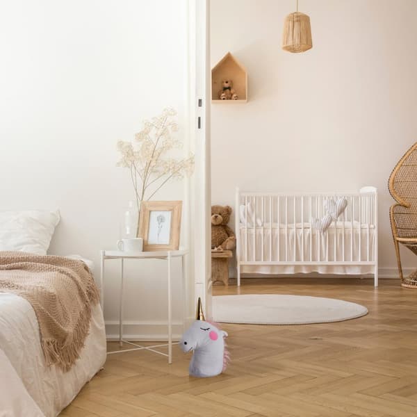 Unicorn dørstopper i hvitt