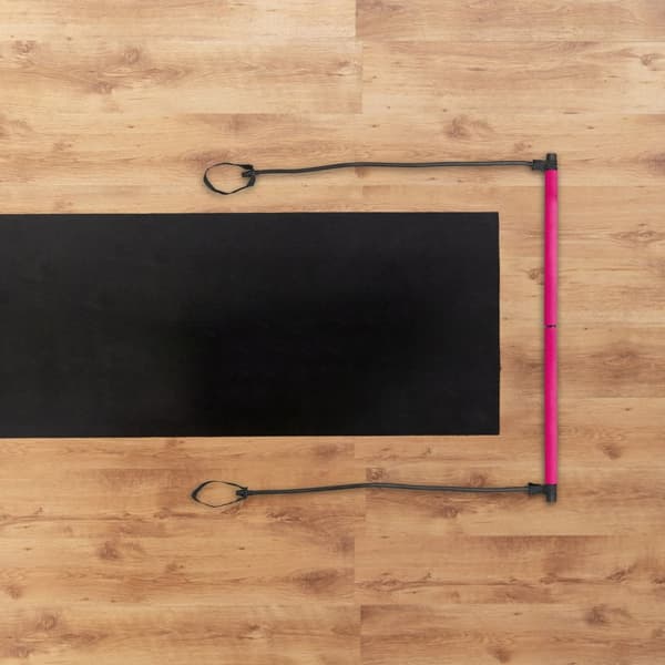 Pilatesstang med motstandsbånd