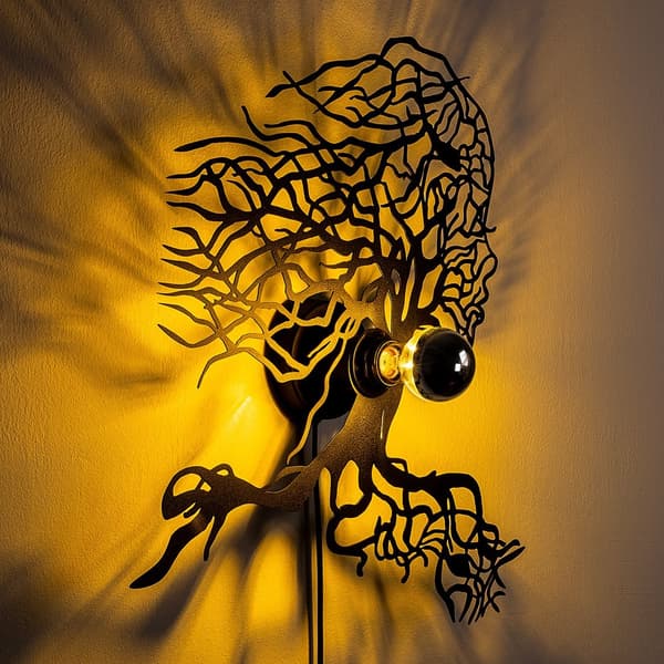 Vägglampa träd kvinna