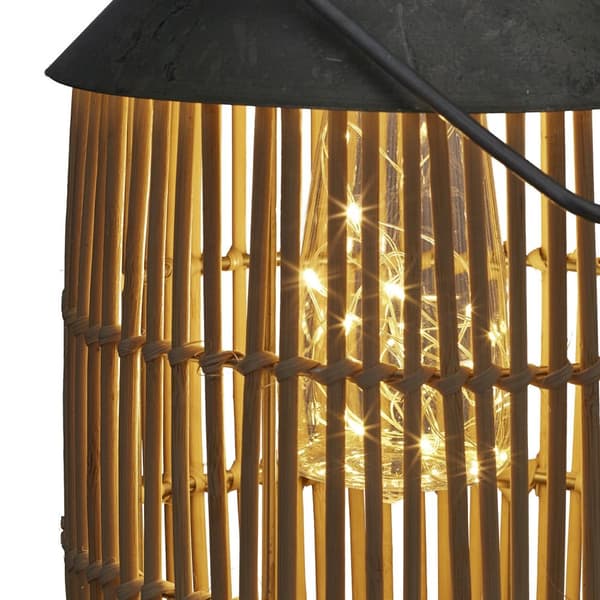 Solcellelampe i metal og rattan
