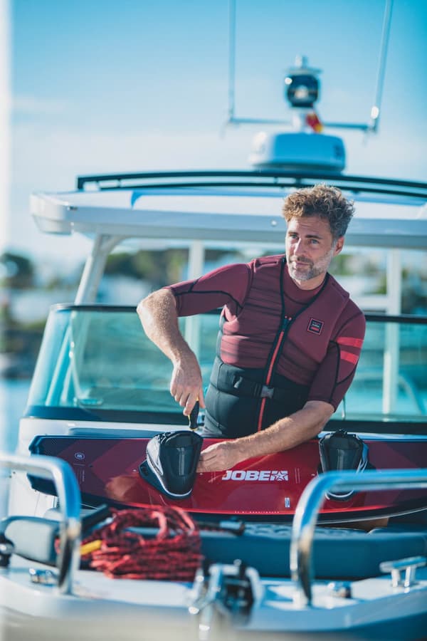 Vattensportväst JOBE Unify Vest Men 50N Red Flytväststorlek: Large (72 - 80 kg)