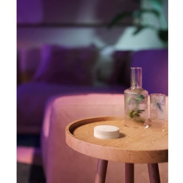 Philips Hue-knappfjärrkontroll med vridreglage, vit, låter dig styra olika delar eller ett område