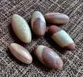 Miniatyrbild 1 av 2: Shiva Lingam trumlad AA 30-45mm 1 styck
