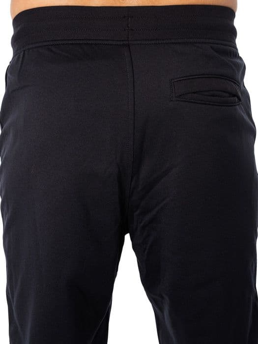 Joggingbyxor - UA - Sportstyle - Svart - Lös passform - Andningsbar
