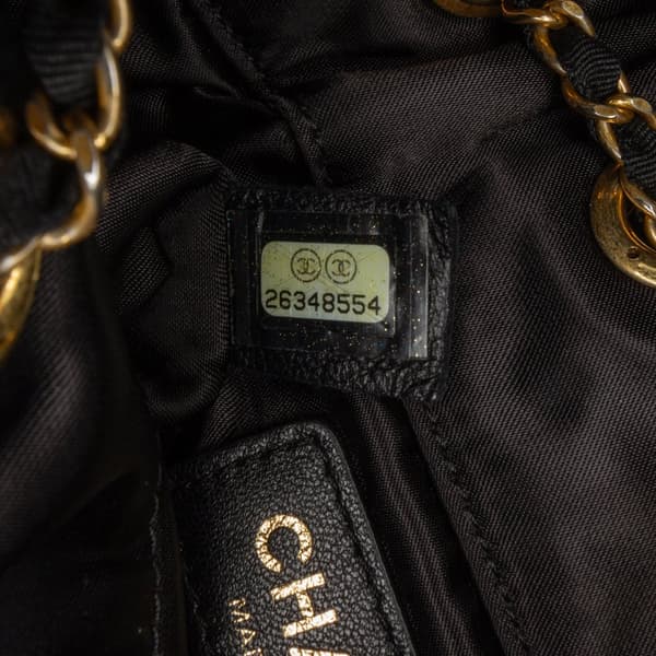 Pre-owned Chanel Quilted Nylon Crystal CC Drawstring Sling Bag Black