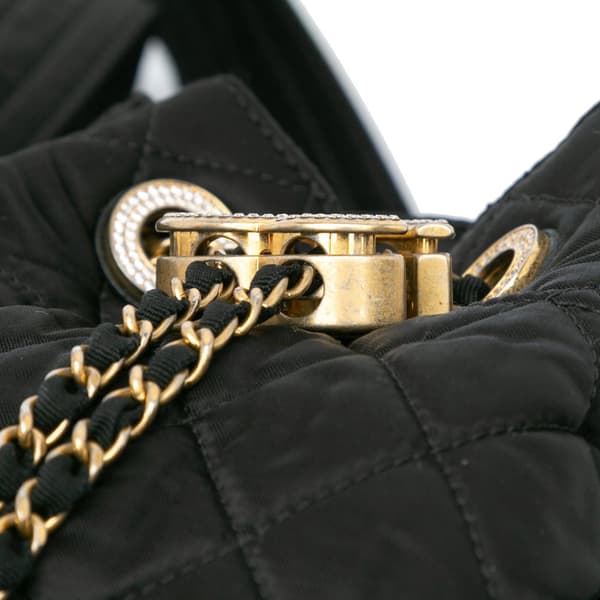 Pre-owned Chanel Quilted Nylon Crystal CC Drawstring Sling Bag Black