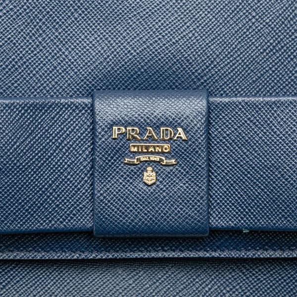 Pre-owned Prada Saffiano Lux Bow Wallet On Strap Blue