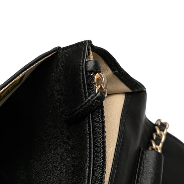 Pre-owned Chanel Lambskin Camellia Embossed Wallet On Chain Black