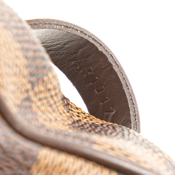 Pre-owned Louis Vuitton Damier Ebene Etui Okapi PM Brown