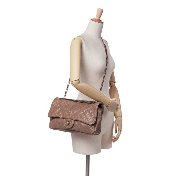 Pre-owned Chanel Large Quilted Glazed Caviar Shiva Flap Brown