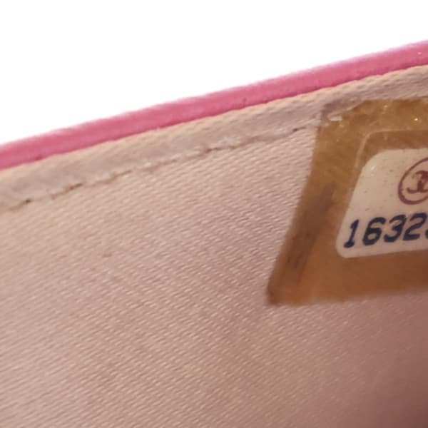 Pre-owned Chanel Embossed Lambskin Camellia Wallet On Chain Pink