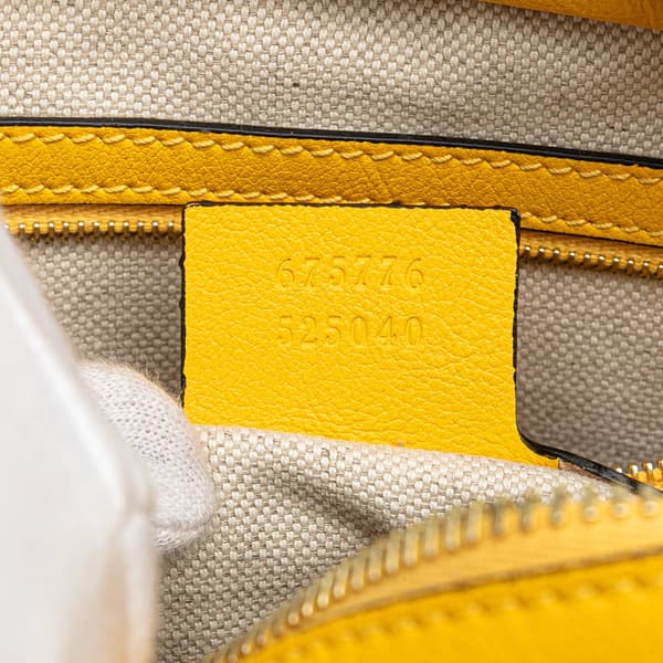Pre-owned Gucci GG Star Embossed Leather Crossbody Yellow