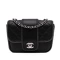 Pikkukuva 1 / 10: Pre-owned Chanel Mini Quilted Lambskin and Metallic Trim Elementary Chic Flap Black