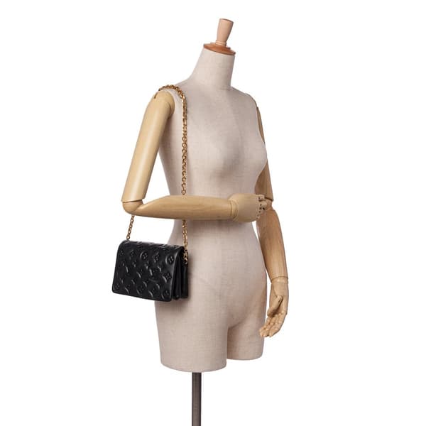 Pre-owned Louis Vuitton Monogram Embossed Pochette Coussin Black