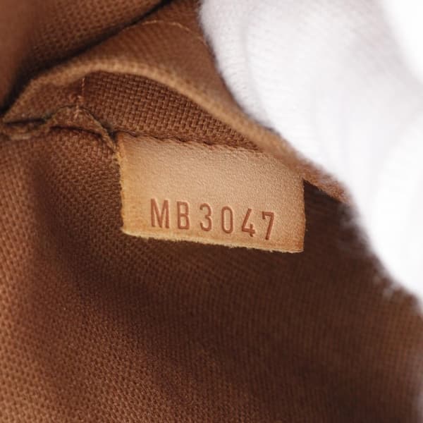 Pre-owned Louis Vuitton Monogram Tulum GM Brown