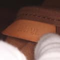 Miniatyrbild 6 av 10: Pre-owned Louis Vuitton Monogram Saumur 35 Brown