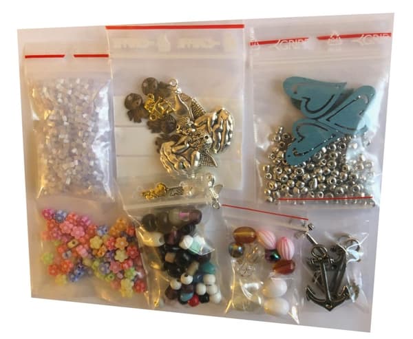 ett paket med pärlor prova på olika sorter