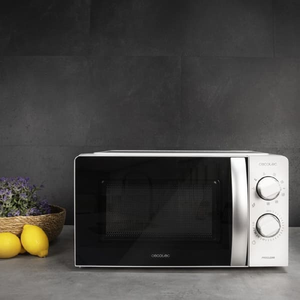 Cecotec 20-litre capacity microwave oven with grill function, 6 power levels, timer, and rotary control knob.