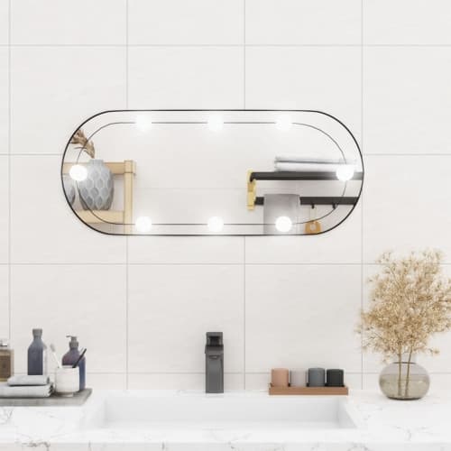 Väggspegel med LED-belysning 30x70 cm glas oval