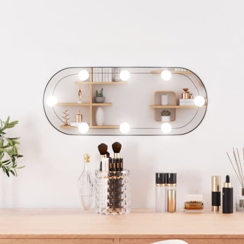 Väggspegel med LED-belysning 20x50 cm glas oval