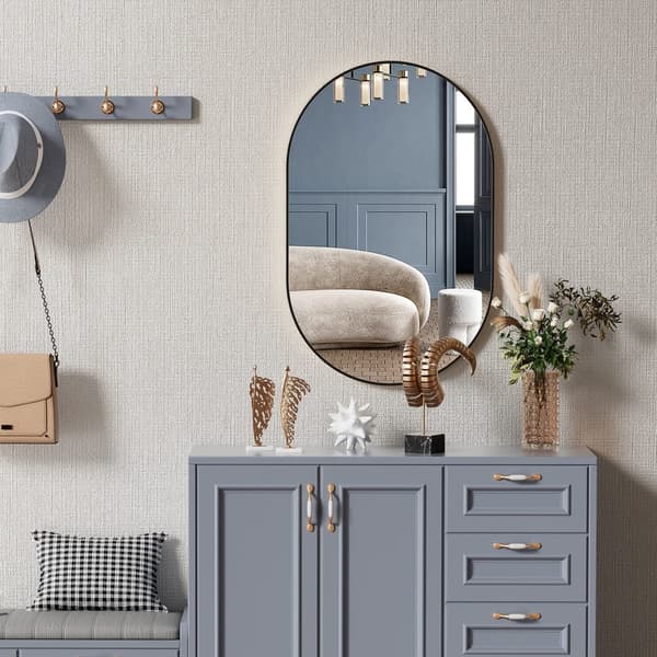 Oval spegel 100x50cm svart ram