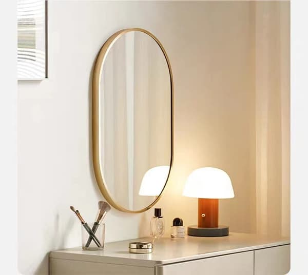 Oval spegel 80x40cm guldram