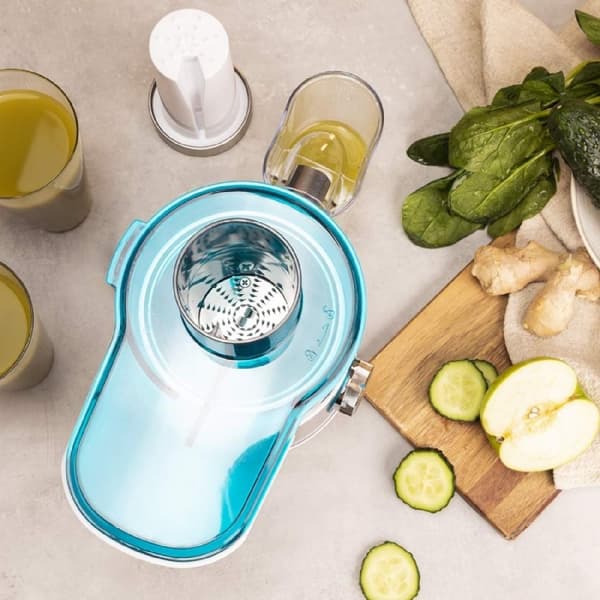 Cecotec 40-W centrifugal juicer with compact design and titanium-coated disc.