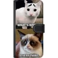 Pikkukuva 3 / 3: Apple iPhone 13 Lompakkokotelo Mikä on vikana?
