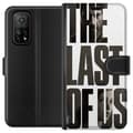 Miniatyrbild 1 av 3: Xiaomi Mi 10T Pro 5G Plånboksfodral The Last of Us Ellie Joel Apokalyps Clickers TV-serie Fanart Dystopi Spelmotiv