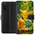 Pikkukuva 1 / 3: Sony Xperia 10 II Lompakkokotelo Pixelmonster pelityyli - värikäs muotoilu retroa rakastaville pelaajille