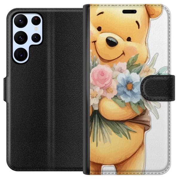 Samsung Galaxy S22 Ultra 5G Lompakkokotelo Nalle Puh kukkien kanssa - klassinen lasten suosikki kukkivassa keväisympäristössä