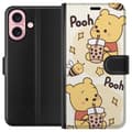 Pikkukuva 1 / 3: Apple iPhone 16 Lompakkokotelo Nalle Pooh - klassinen karhumotiivi uudessa tulkinnassa
