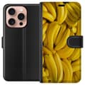 Miniatyrbild 1 av 3: Apple iPhone 16 Pro Plånboksfodral Banana Pattern – lekfullt mönster med gula bananer