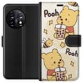Miniatyrbillede 1 af 3: OnePlus 11R Tegnebogsetui Nalle Pooh-stil - klassisk bjørnemotiv i en ny fortolkning