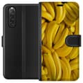 Miniatyrbild 1 av 3: Sony Xperia 10 V Plånboksfodral Banana Pattern – lekfullt mönster med gula bananer