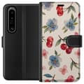 Miniatyrbilde 1 av 3: Sony Xperia 1 IV Lommeboketui Bær & Blomster - mønster med blå blomster og skogsbær