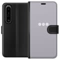Miniatyrbilde 1 av 3: Sony Xperia 1 IV Lommeboketui Lilla Blomminimalisme - stilig blomstermotiv på lilla bakgrunn