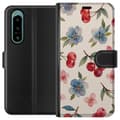 Miniatyrbillede 1 af 3: Sony Xperia 5 IV Tegnebogsetui Bær & Blomster - mønster med blå blomster og skovbær
