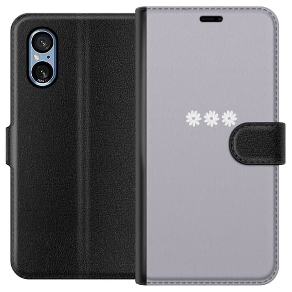 Sony Xperia 5 V Lompakkokotelo Lila Blomminimalismi - tyylikäs kukkakuva lila taustalla