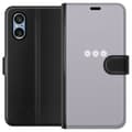 Pikkukuva 1 / 3: Sony Xperia 5 V Lompakkokotelo Lila Blomminimalismi - tyylikäs kukkakuva lila taustalla