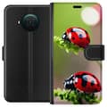 Miniatyrbild 1 av 3: Nokia X10 Plånboksfodral Nyckelpiga Insekt Lycka Symbol Naturmotiv Populärt Grafiskt Motiv Dekoration Sommar Tur