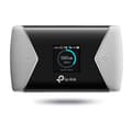 Pikkukuva 1 / 3: TP-LINK M7650 -LTE-modeemi ja WiFi-tukiasema