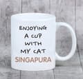 Pikkukuva 6 / 6: Singapura - muki grafiikalla ja Art-Dog-tuotemerkin kirjoituksella