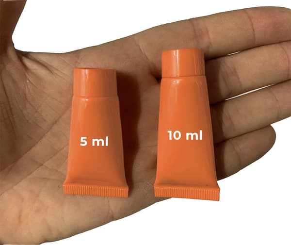 Set med 50 påfyllningsbara kosmetiktuber (10 ml, orange)