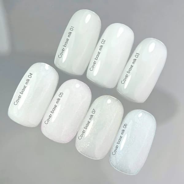 NAILSOFTHEDAY Dækbund NY Milk 05 - semi-transparent mælkeagtig base med pink glitter, 30 ml